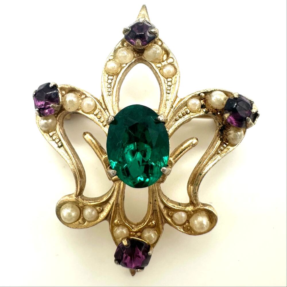 Vintage gold tone green purple rhinestones faux pearls Fleur de Lis brooch